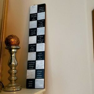 Love is wall decor made of wood 26 inches tall. Check video for measurements.